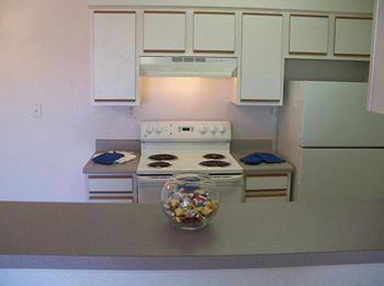Bright kitchen in Gardens at Pryor Creek Apartments